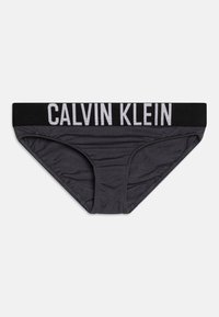 Slip grigio in cotone con elastico nero con logo bianco "CALVIN KLEIN". Presenta una texture liscia e un design a taglio classico per il massimo comfort.