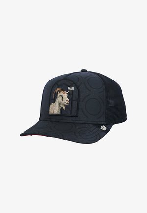 Gorra de béisbol negra de malla con patrón circular, parche bordado con cabeza de cabra y texto pequeño "HIM" en el panel frontal.