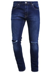 Mörkblå denimjeans med slim fit, med rivna knän, en klassisk femficksdesign och kontrasterande sömmar.