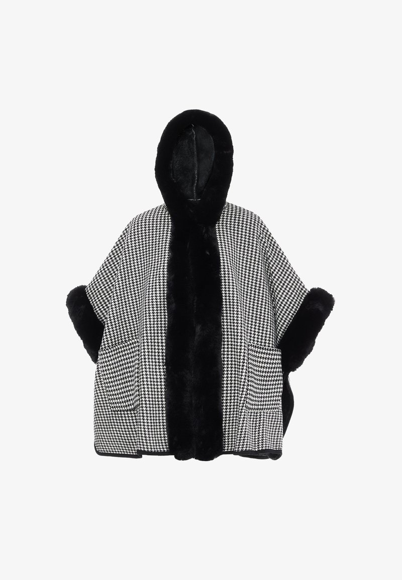 Fekete-fehér houndstooth mintás poncsó, fekete prémmel bélelt kapucnival és mandzsettával. Elöl zsebekkel rendelkezik és laza, áramló szabása van.