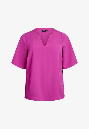 Fuksija bluzica kratkih rukava s V-izrezom. Glatka tekstura i lagan kroj. Jednostavan dizajn, bez uzoraka ili dodatnih ukrasa.
