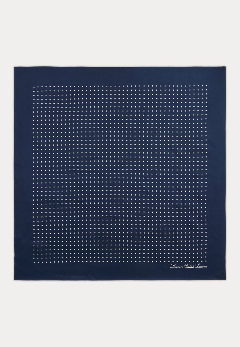 Navy blue silk scarf with white polka dots evenly spaced and "Lauren Ralph Lauren" signature in white at bottom right corner.
