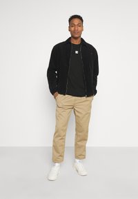 The North Face CENTRAL LOGO  - T-shirt estampada - black