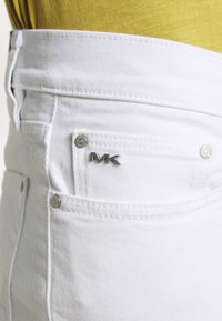 Michael Kors Vaqueros pitillo - white