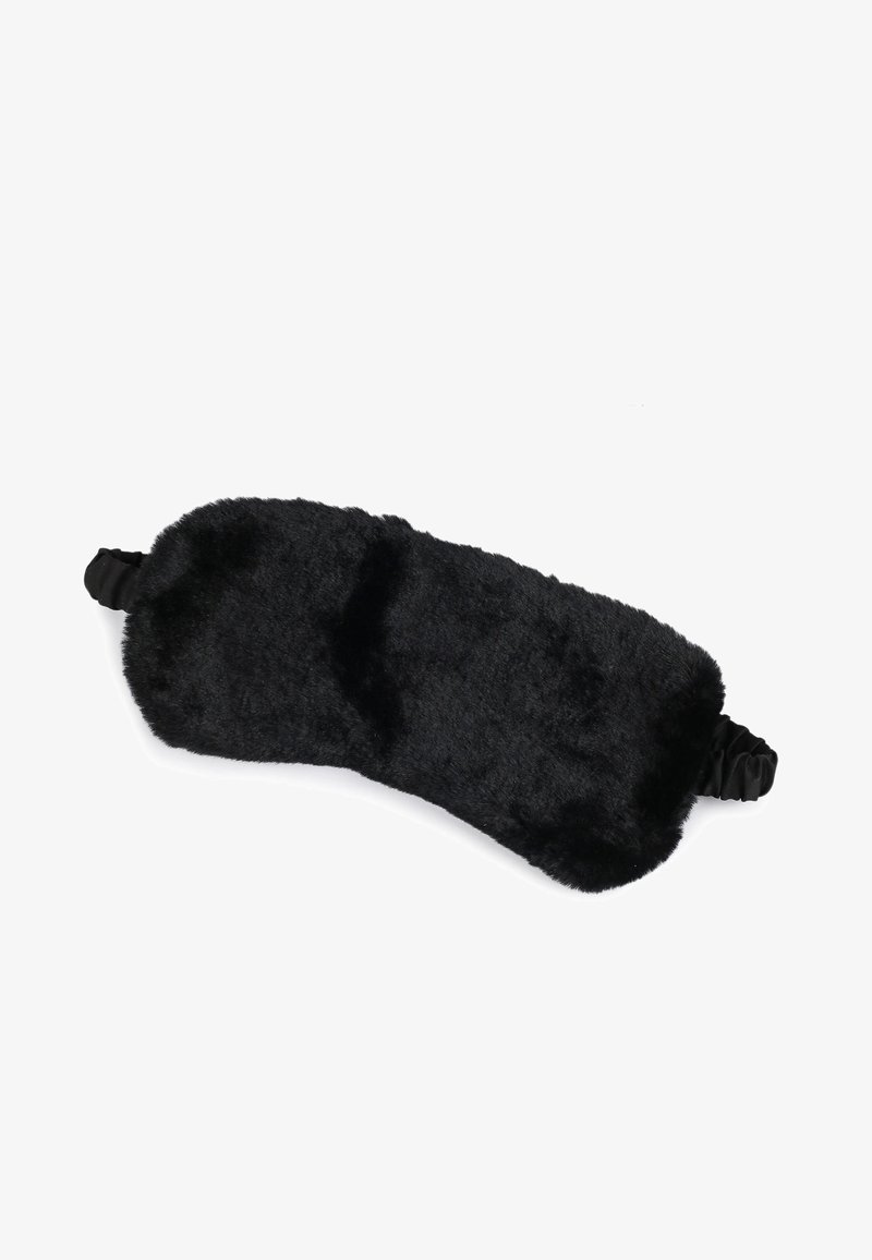 Maschera da sonno nera e morbida in morbido tessuto peloso con elastici su entrambi i lati per una vestibilità sicura. Forma rettangolare con angoli arrotondati.