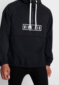 Nike Sportswear Vindjacka - black