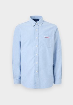 Ανοιχτό μπλε πουκάμισο με μακριά μανίκια και κουμπιά, με γιακά που κουμπώνει, εμπρόσθια τσέπη και κέντημα με το λογότυπο "Polo Sport Ralph Lauren" στην τσέπη.