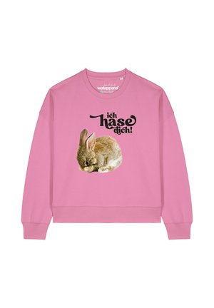 Sweatshirt rose avec un graphisme de lapin en train de dormir et le texte "ich hasse dich!" en lettres noires en gras. Design classique avec col rond.