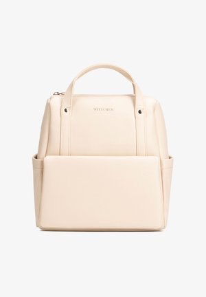 Crèmekleurige leren rugzak met handvat bovenop, voorvak met ritssluiting, zijvakken en "WITTCHEN" logo reliëf op het voorpaneel.