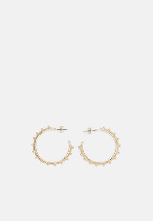 Gold hoop earrings with a textured design, featuring small beads along the edge. They have a closed hoop shape and a stud backing.