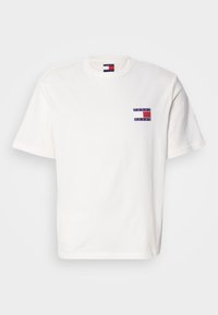 T-shirt branca de algodão com mangas curtas. Apresenta um pequeno logótipo multicolor no peito. Design clássico com gola redonda.