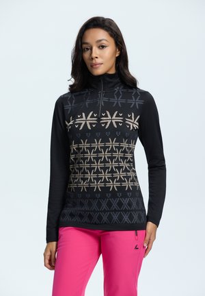Langsleeve zwart top met half-rits; heeft geometrische patronen in beige en donkerblauw. Soepele textuur, aansluitende pasvorm en hoge kraag.