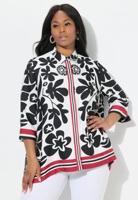 Camicia a maniche lunghe con motivo floreale in bianco e nero, con strisce rosse sui polsini e sul davanti; dotata di colletto a punta e vestibilità comoda.