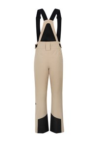 Beige Skihosen mit schwarzen Akzenten, verstellbaren Trägern und einem Netzrücken. Hergestellt aus einem strapazierfähigen Material mit weit geschnittenen, lockeren Beinen.