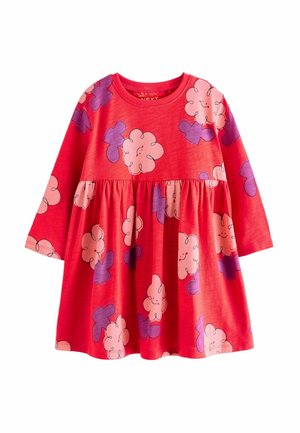 Robe rouge à manches longues pour tout-petit avec taille froncée, décorée de grands motifs de fleurs souriantes roses et violettes.