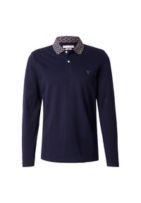 Polo de manga larga azul marino con cuello a rayas, con un cierre de tres botones y un logotipo triangular en el pecho. Material de algodón suave.