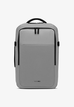 Šedý batoh s hladkým matným povrchem. Obsahuje dvě zipové přihrádky, černé akcenty a horní rukojeť pro nošení.
