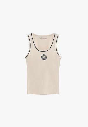 Beige tanktop med sort kant og et cirkulært broderet logo i midten. Lavet af blødt, glat stof med en tætsiddende design.