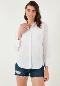 Blusa - white