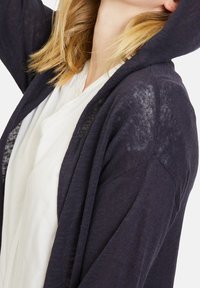 Cartoon Neuletakki - blue