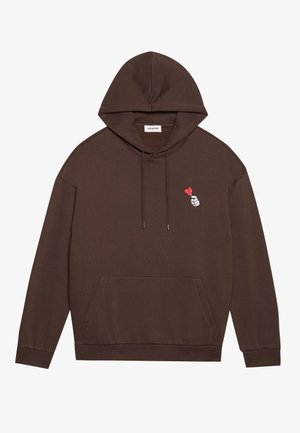 Brown hoodie made of soft fabric, featuring a front pocket, drawstring hood, and a small embroidered design of a hand holding a red heart.