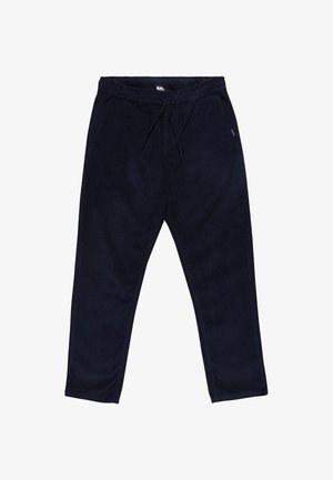 Navy corduroy-housut, joissa on joustava vyötärö, nyöri, sivutaskut ja suora lahje; pehmeä rakenne ja hillitty pystyribbaus.
