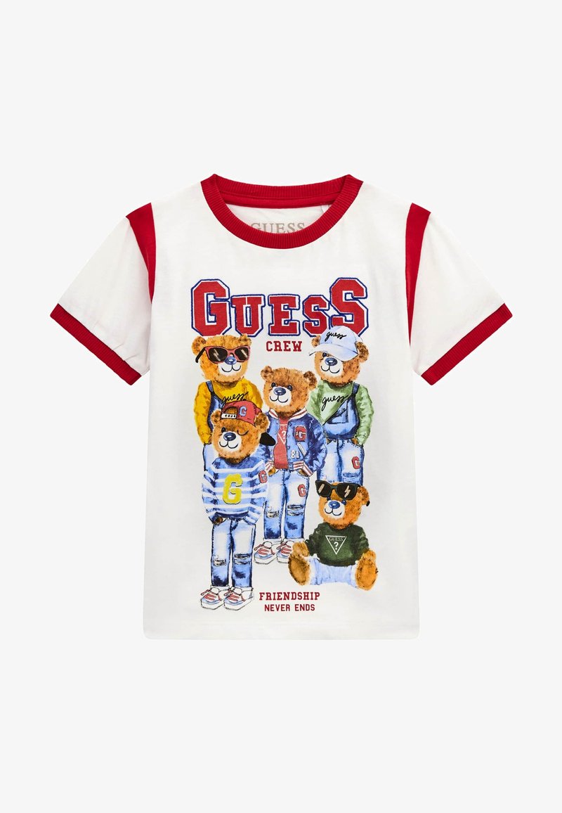 T-shirt bianco con maniche corte rosse, caratterizzato da una grafica colorata di orsi dei cartoni in abbigliamento. Il testo recita "L'AMICIZIA NON FINISCE MAI".