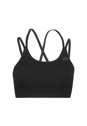 Brassière de sport noire avec fines bretelles croisées et un petit logo réfléchissant sur le haut à gauche.