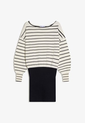 Vestito a maniche lunghe con righe orizzontali bianche e nere nella parte superiore e gonna aderente nera nella parte inferiore. Scollo a barca e polsini a coste.