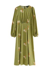 Zaļš kleita ar garām piedurknēm, rotāta ar rūtainu rakstu un ziedu akcentiem oranžā un baltā krāsā, piedāvā saliektu jostu un brīvi plūstošu siluetu.
