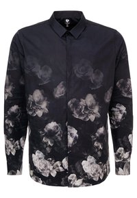 Chemise noire à manches longues avec des motifs floraux subtils de roses grises, col pointu et boutons avant cachés.