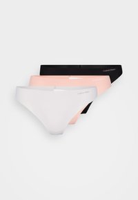 Drie paar Calvin Klein damesstringetjes: één zwart, één perzikkleurig en één wit. Gladde stof met elastische taillebanden; minimale merkidentificatie is zichtbaar.