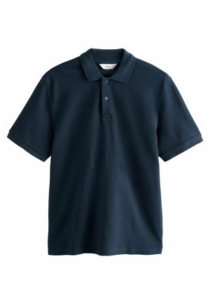 Polo shirt blu navy realizzato in tessuto a maglia testurizzata, con colletto classico, patta con tre bottoni e maniche corte.
