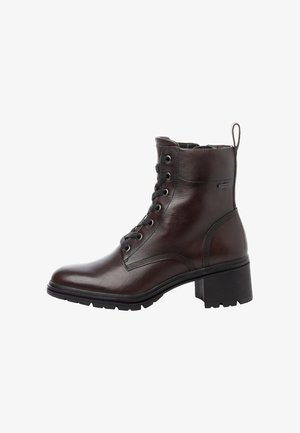 Brown leather ankle boot with a rounded toe, lace-up front, sturdy black rubber sole, and a low block heel. Features a rear pull tab.
