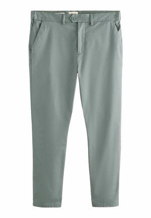 Schmal geschnittene hellgraue Chino-Hosen mit Knopf- und Reißverschluss vorne, Gürtelschlaufen und seitlichen Taschen, auf weißem Hintergrund gezeigt.