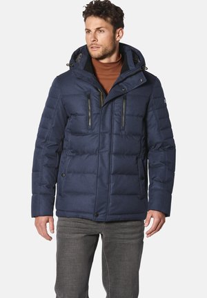 Marineblau gesteppte Jacke mit Kapuze, zwei mit Reißverschluss versehenen Brusttaschen, Knopfverschluss und strukturiertem Stoff.