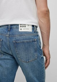 BOSS - Maine Regular-fit jeans in degradé indigo denim - Dark Blue