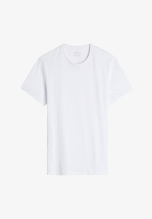 Camiseta blanca de manga corta con cuello redondo. Fabricada en suave tejido de algodón, presenta un corte holgado y costuras mínimas.