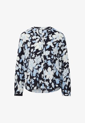 Blouse fleurie à manches longues en bleu marine avec des fleurs bleu clair et blanches. Elle présente un col en V et une coupe décontractée avec un ourlet arrondi.