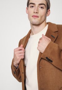 Redefined Rebel TORRES UNISEX - Camisola de lã polar - sandshell