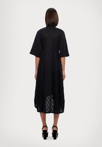 Robe Henrik Vibskov Stream Jersey - Noir - Taille 40 - Manches 3/4 - Neuf Avec étiquettes