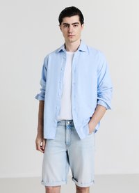 Calliope SLAVATO - Shorts di jeans - blu denim slavato