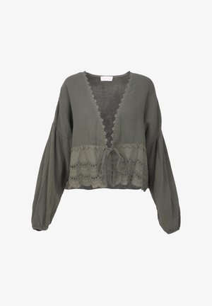Olivgrüne, kurz geschnittene Bluse aus leichtem Stoff mit V-Ausschnitt, langen Ärmeln und Spitzenverzierungen an der Taille mit Bindeband.