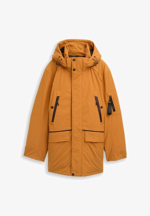 Küpsetatud oranž isoleeritud jope kapuutsiga, millel on tõmblukuga taskud, eesnepp kinnitusega ja eristuv must äär tõmblukkudel.