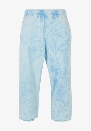 Világoskék melegítőnadrág, amelynek batikolt mintája van, rugalmas derékrészével és bokánál eldolgozott szárával. Puha anyagból készült, laza szabású.