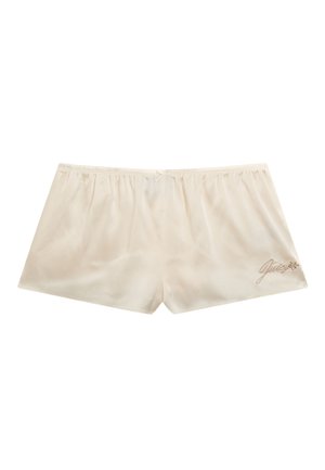 Crème-kleurige satijnen shorts met een elastische tailleband en een decoratief geborduurd logo in de rechterbenedenhoek. Gladde textuur.