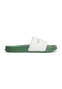 Sandale à glissière verte avec une bride blanche sur le dessus arborant un texte de marque embossé, conçue pour un usage décontracté.