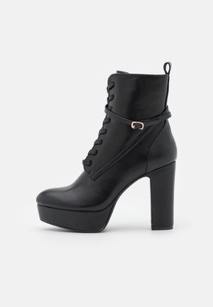 Bottines à talons hauts - black