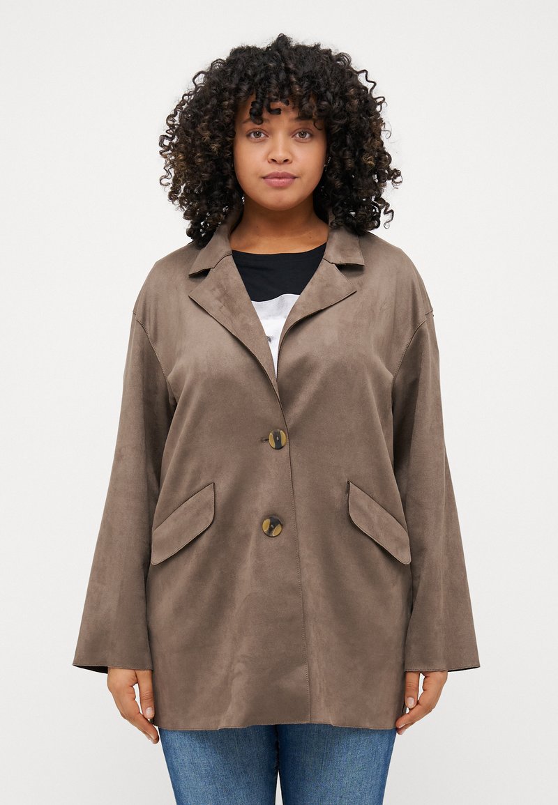 Brown faux-suede jacket with a notched collar, two front pockets, and two round buttons; features loose, wide sleeves and a smooth texture.