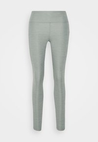 Leggings gris clair en tissu doux et texturé avec une taille haute élastiquée. Coupe ajustée sans coutures ni motifs visibles.